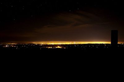 Illuminated cityscape at night