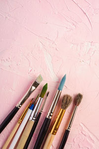 High angle view of paintbrushes on table