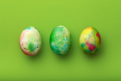 Close-up of easter egg against yellow background