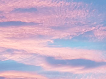 Low angle view of clouds in sky during sunset