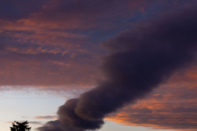 Low angle view of dramatic sky during sunset