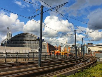 Train on railroad tracks against sky