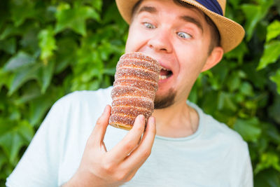 Portrait of man eating food