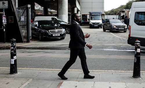 Full length of man on city street