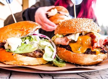 Close-up of burgers in plate on table