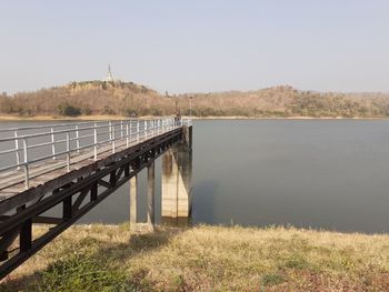 Bridge over river against sky