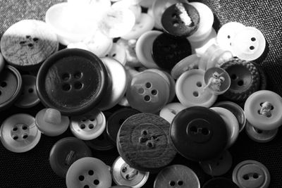 High angle view of various buttons on table