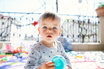 Portrait of cute boy looking away