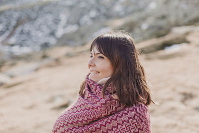 Woman wrapped in shawl