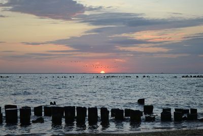 Scenic view of sea against sky during sunset