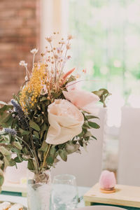 Close-up of flower vase on table