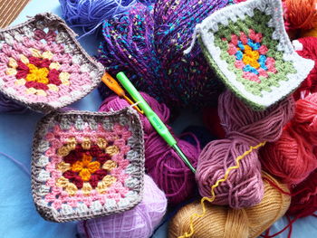 Close-up of knitting equipment on table