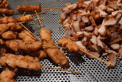 Close-up of meat on barbecue grill