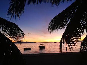 Scenic view of sea at sunset