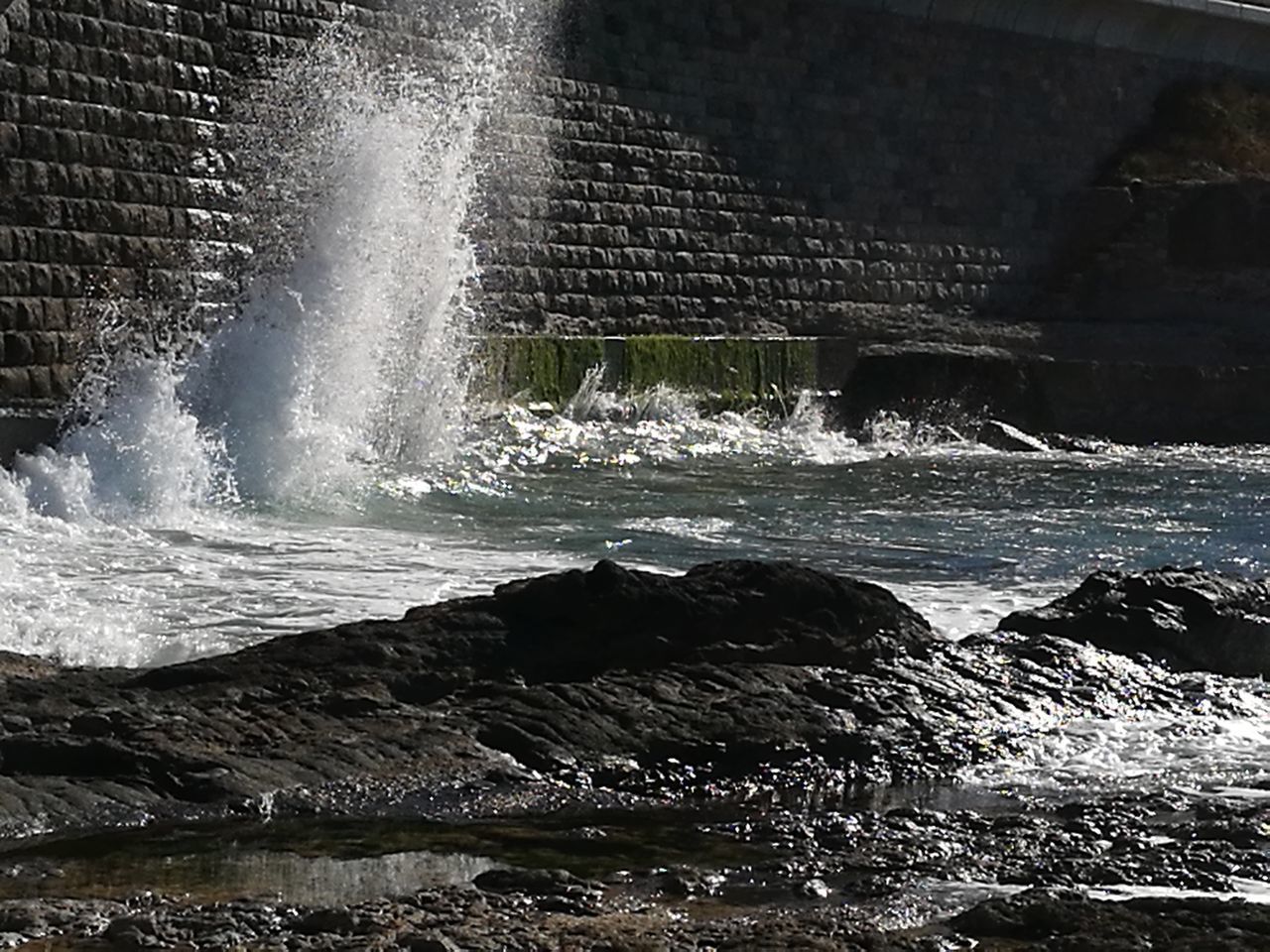 WAVES SPLASHING ON WATER