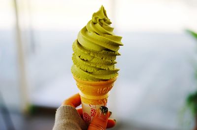 Woman holding ice cream cone