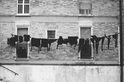Clothes drying against building