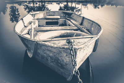 High angle view of boat moored in lake