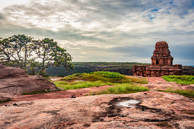 Ancient temple with mountain background at morning