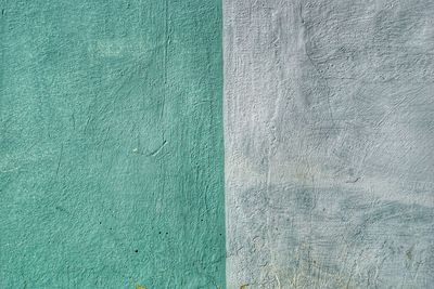 Full frame shot of gray and turquoise colored wall