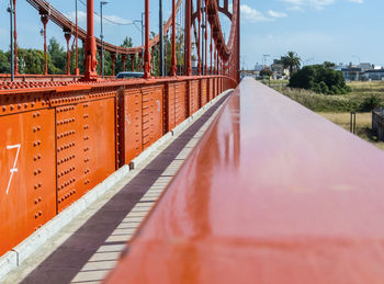 Surface level of bridge against sky