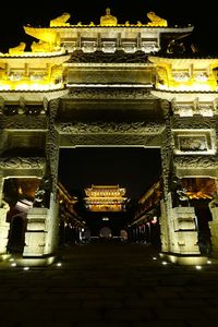 Illuminated temple at night