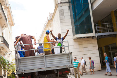 People standing on street in city