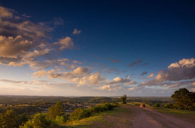 Scenic view of road against sky during sunset