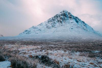 Scenic view of snowcapped mountain against sky