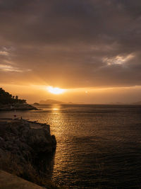 Scenic view of sea against sky during sunset