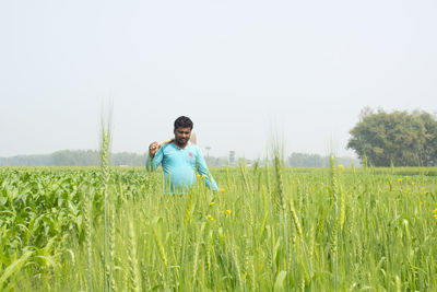 Man standing in field