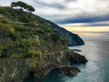 Scenic view of sea against cloudy sky