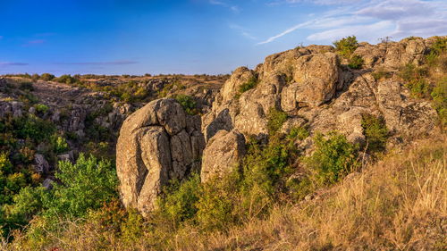 Deep granite canyon with the mertvovod river in aktovo village, nikolaev region, ukraine