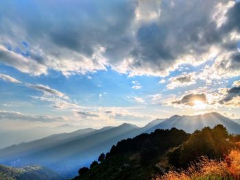 Scenic view of mountains against sky during sunset