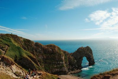 Scenic view of sea against blue sky