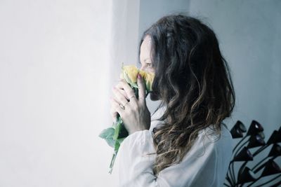 Young woman with hands in hair