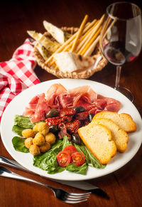 Close-up of food served on table