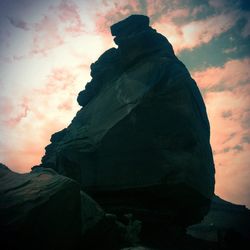 Low angle view of statue against sky