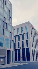 Low angle view of modern building against sky