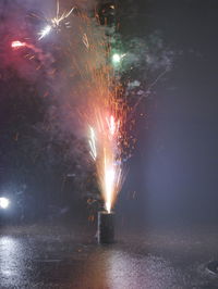 Firework display at night