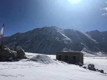 Scenic view of snowcapped mountains against clear sky