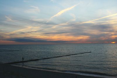 Scenic view of sea against dramatic sky