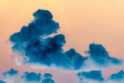 Low angle view of clouds in sky during sunset