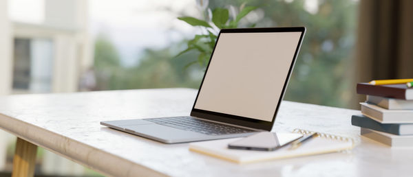 Close-up of laptop on table