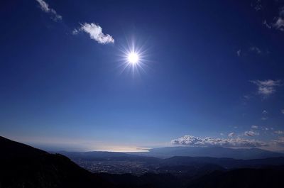 Scenic view of landscape against sky at night