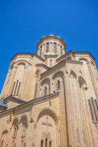 Low angle view of cathedral against blue sky