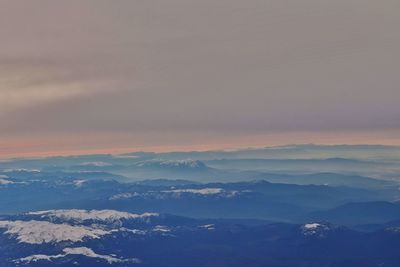 Aerial view of landscape against sky during sunset