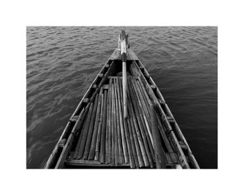 Low angle view of wooden structure against sky