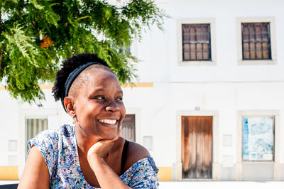 Portrait of smiling woman outdoors