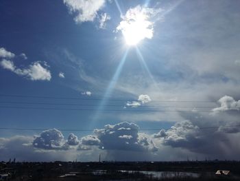 Sun shining through clouds